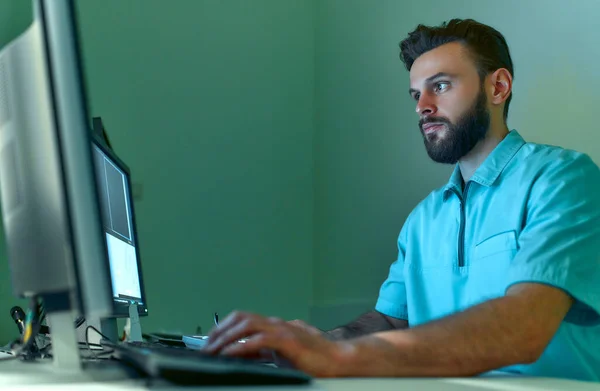 In the medical laboratory, the patient undergoes an MRI or CT scan under the supervision of a radiologist, in the control room, the doctor observes the procedure and monitors the scan results.