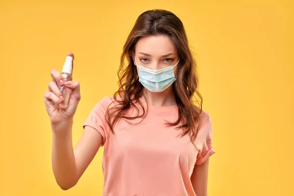 Beautiful Girl Casual Clothes Medical Protective Mask Holding Antiseptic Spray — Stock Photo, Image