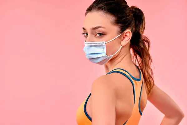 Cute Sporty Girl Sportswear Protective Medical Mask Isolated Pink Background — Stock Photo, Image