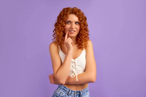 Cute Red Haired Girl Curls Holds Finger Her Cheek Thinks — Stock Photo, Image