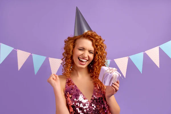 Cute Red Haired Woman Curls Shiny Dress Party Cap Holding — Stock Photo, Image