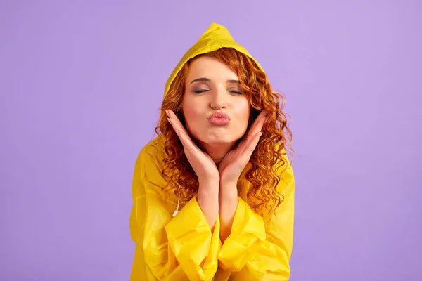 Redhead Woman Yellow Raincoat Having Fun Isolated Purple Background — Stock Photo, Image