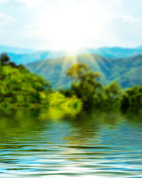 Superficie Ripeada de agua y desenfoque fondo de la naturaleza —  Fotos de Stock