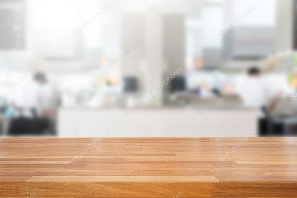 Empty wooden table and blurred kitchen background   Stock 