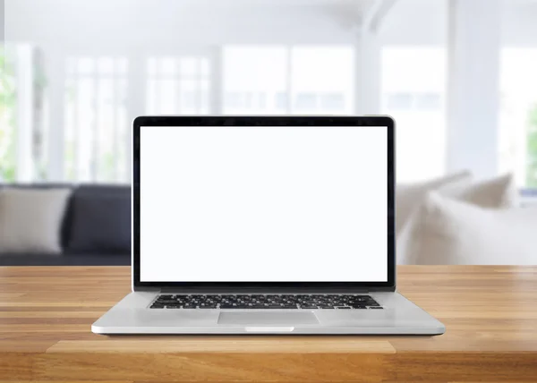 Laptop com tela em branco na mesa. fundo interior — Fotografia de Stock