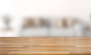 Ahşap masanın üstü beyaz, temiz, soyut ve bulanık arka plan üzerine bokeh.Ürünlerinizi görüntülemek veya montajlamak için kullanılır. Pankart