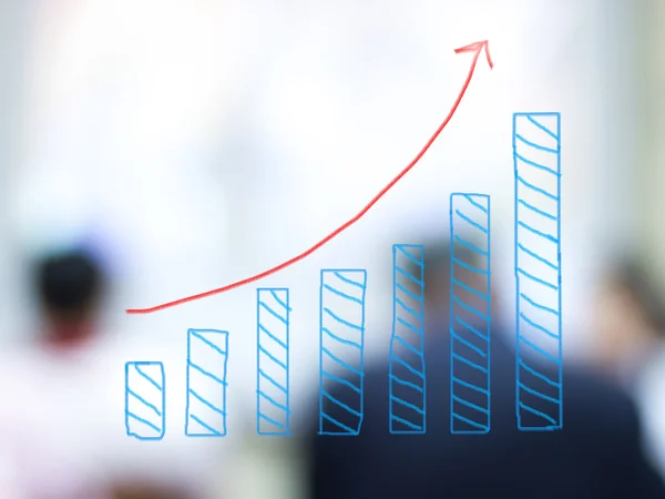 Growth bar chart with blurred business people background — Stock Photo, Image