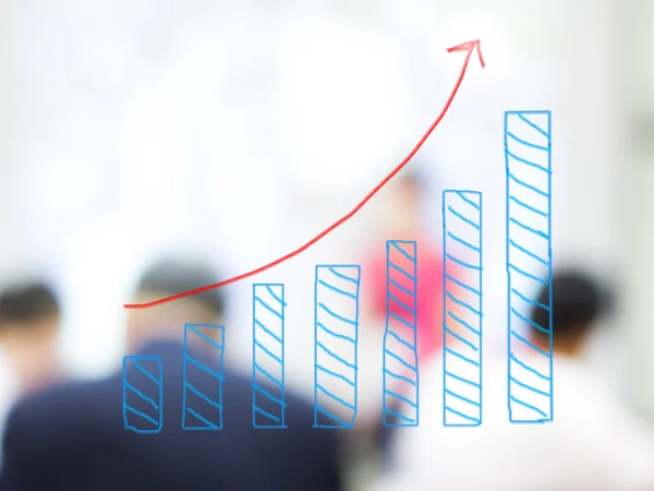 Growth bar chart with blurred business people background — Stock Photo, Image