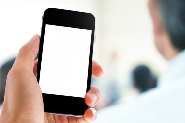 el telefon insanlar üzerinde arka plan tutarak.