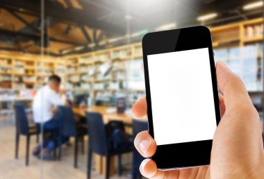 Akıllı telefon Kütüphane arka planda tutan el