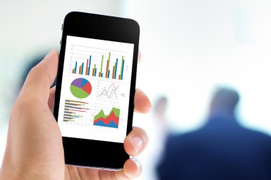 grafik analiz ile cep telefonu tutan hanhand
