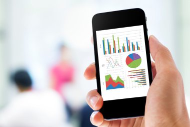 grafik analiz ile cep telefonu tutan hanhand