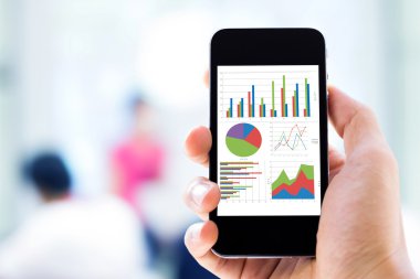 grafik analiz ile cep telefonu tutan el