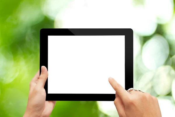 hand holding black digital tablet