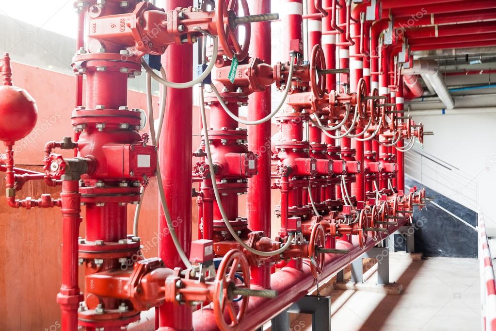 A row of red color fire fighting water supply pipeline system