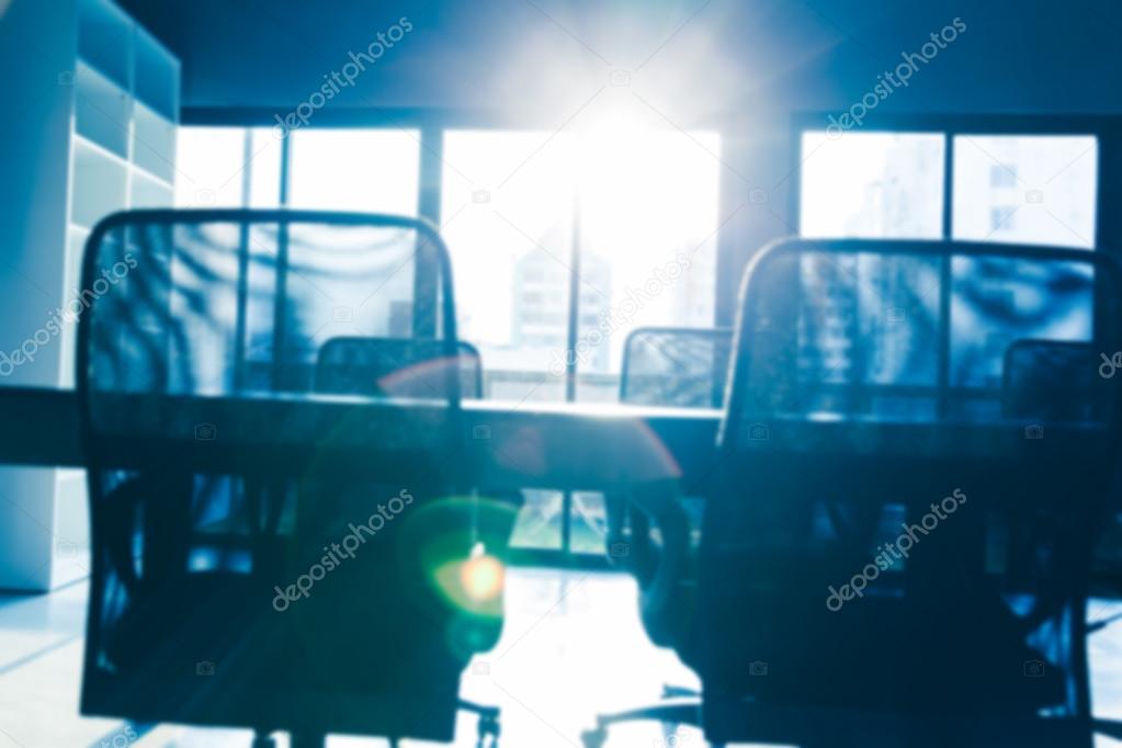 blurred background of of  table and chairs with sun light in mee