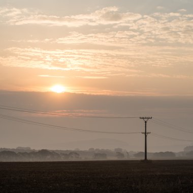 sis alanları üzerinden günbatımı