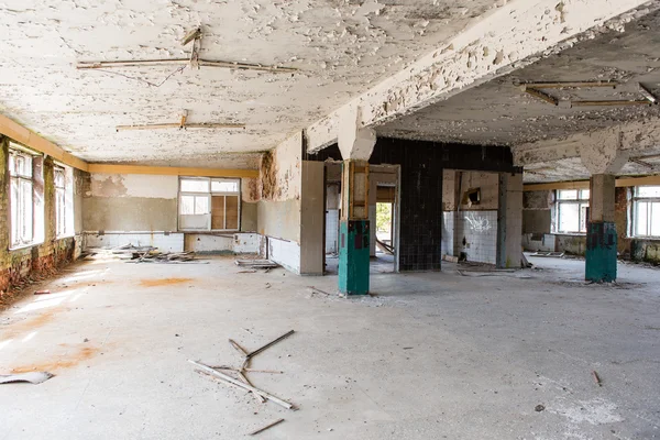 Abandoned interior in ruins of military settlement — Stock Photo, Image