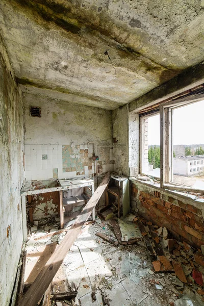 Abandoned interior in ruins of military settlement — Stock Photo, Image