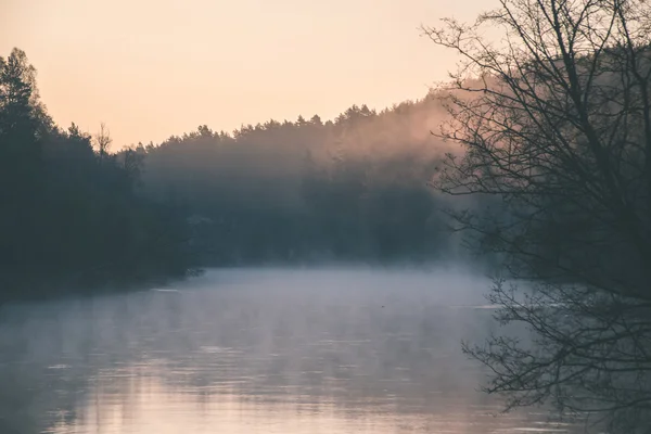 Beautiful foggy river in forest - vintage film effect — Stock Photo, Image