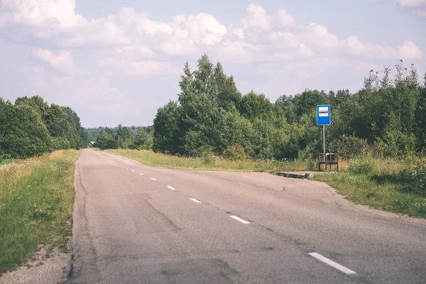 Simple country road in summer - vintage film effect — Stock Photo, Image