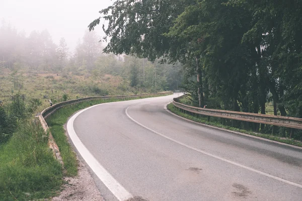 Mountain country road in summer - vintage film effect — Stock Photo, Image