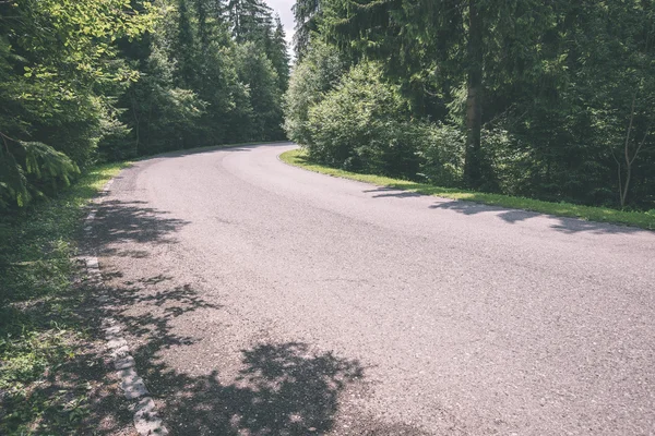 Mountain country road in summer - vintage film effect — Stock Photo, Image