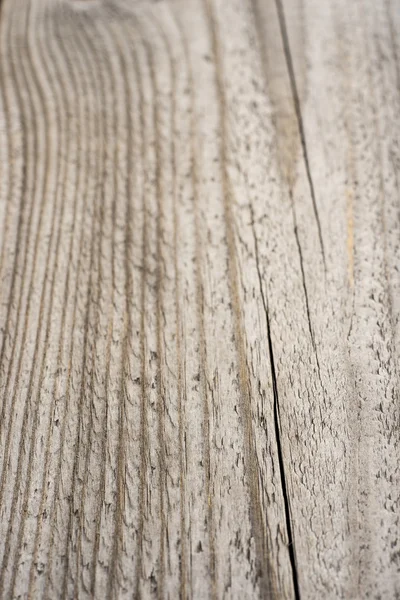 Wooden plank with splinters and cracks — Stock Photo, Image