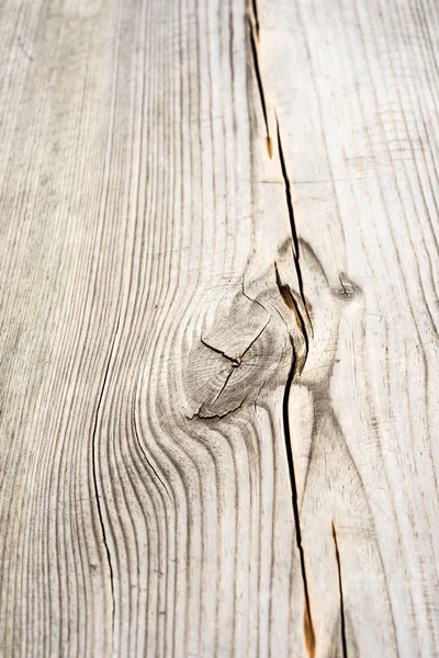 Wooden plank with splinters and cracks — Stock Photo, Image