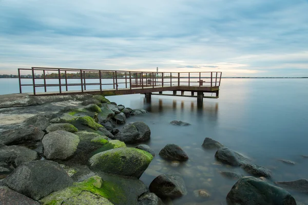 Old bridge with rusty metal rails — Stock Photo, Image