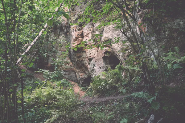 Sandstone cliffs with inscriptions. Vintage. — Stock Photo, Image