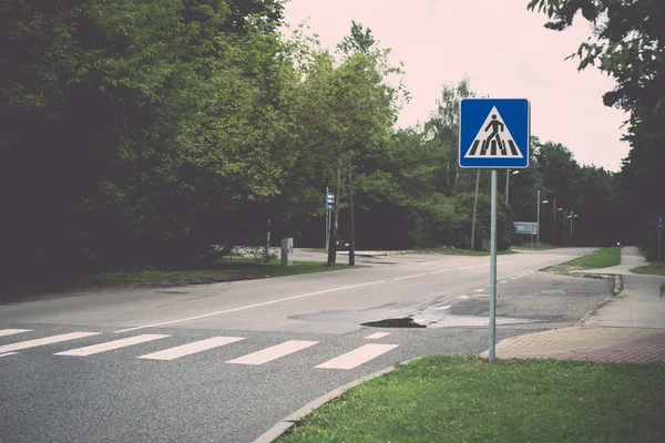 Road signs and lines on asphalt. Vintage. — Stock Photo, Image