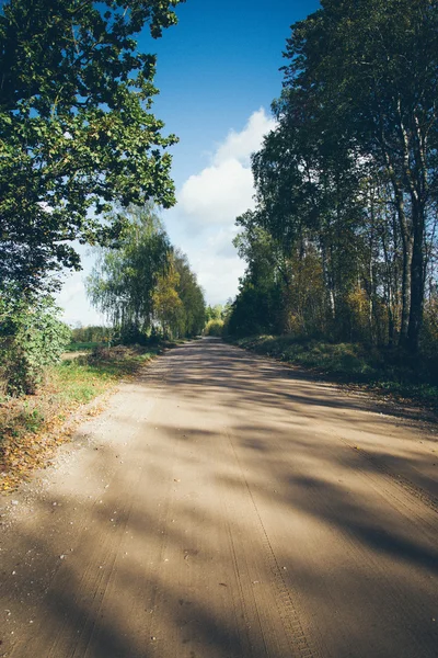 Empty country road. Retro grainy film look.. Retro grainy film l — Stock Photo, Image