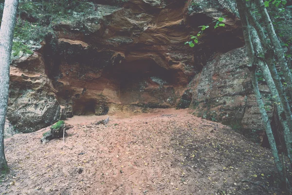 Sandstone cliffs with inscriptions - retro, vintage — Stock Photo, Image