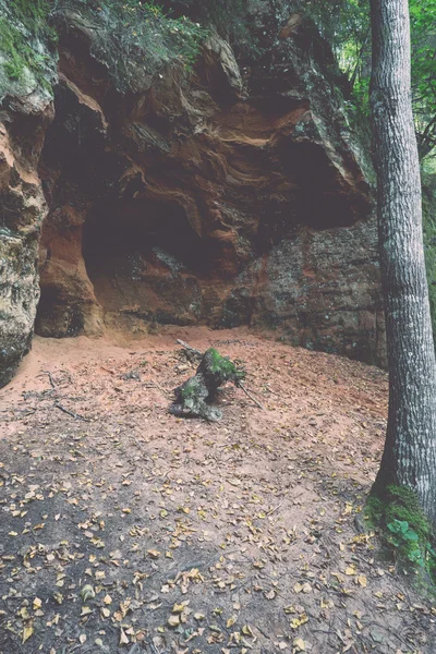 Sandstone cliffs with inscriptions - retro, vintage — Stock Photo, Image