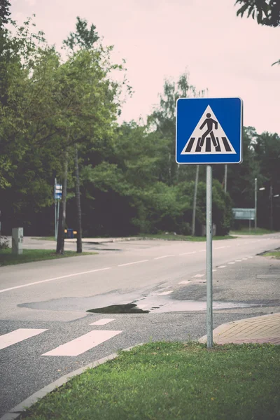 Road signs and lines on asphalt - retro, vintage — Stock Photo, Image