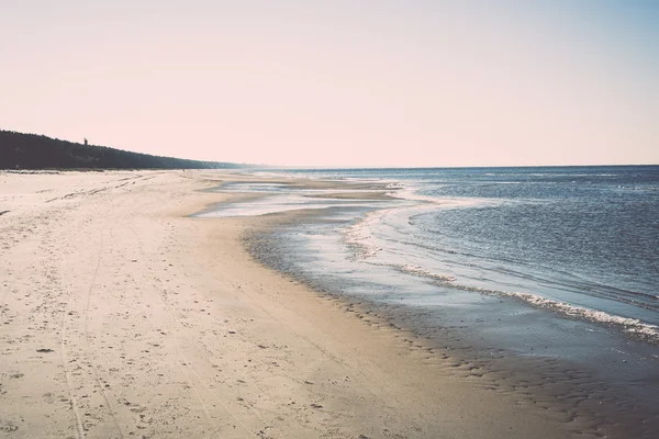 Icy sea beach with first ice pieces - retro, vintage — Stock Photo, Image