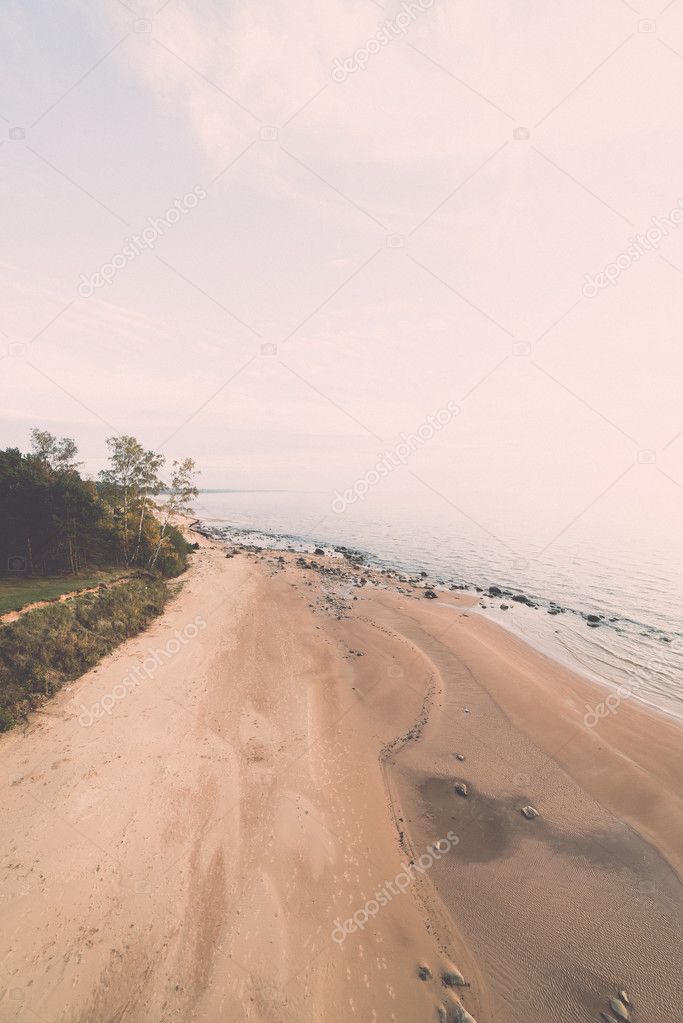 aerial view to the Shoreline of Baltic sea beach with rocks and 