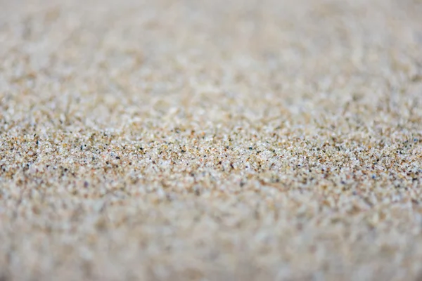 Textura de fundo de areia com profundidade de campo rasa — Fotografia de Stock