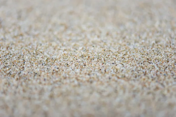 Textura de fundo de areia com profundidade de campo rasa — Fotografia de Stock