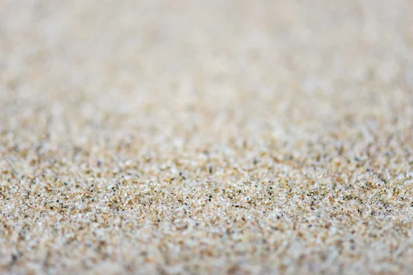 Texture de fond de sable avec une faible profondeur de champ — Photo