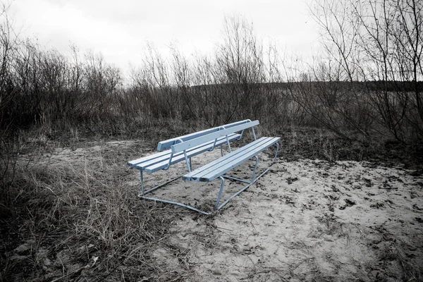 Blue bench on the beach dunes - retro vintage look — Stock Photo, Image