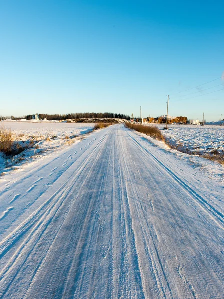 País nevado camino en invierno — Foto de Stock