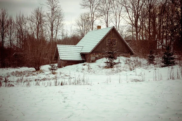 Rural cottage in winter in countryside - retro vintage — Stock Photo, Image