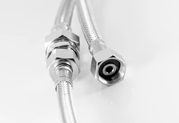 Elastic metal fiber water pipe with connectors — Stock Photo, Image