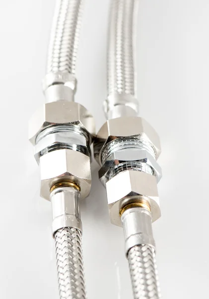 Elastic metal fiber water pipe with connectors — Stock Photo, Image