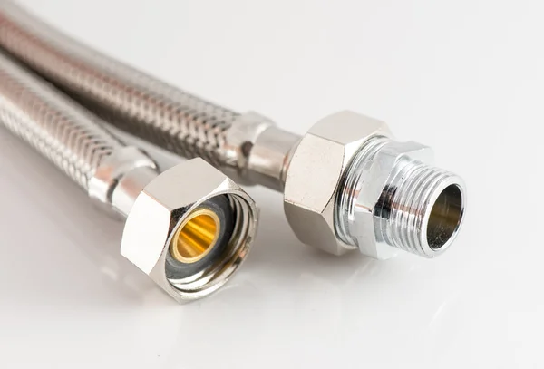 Elastic metal fiber water pipe with connectors — Stock Photo, Image