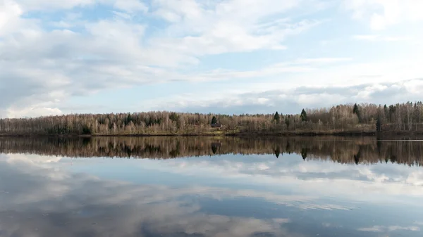 Dramatic clouds over the river — Stock Photo, Image