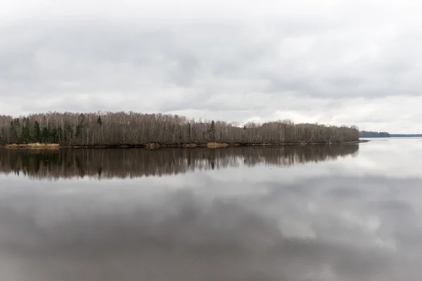 Dramatic clouds over the river — Stock Photo, Image