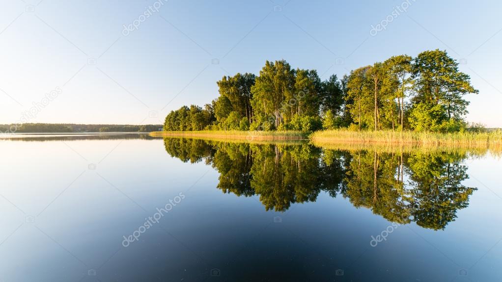 symmetric reflections on calm lake